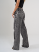 Ref: 065627 Jean Mom Flare, rígido, tiro alto,  detalle en pretina, tono gris medio