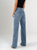 Ref: 065772 Jean Mom Flare, stretch, tiro alto, tono azul medio, detalle en pretina