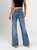 Ref: 065772 Jean Mom Flare, stretch, tiro alto, tono azul medio, detalle en pretina