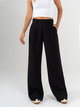 Ref: 069750 Pantalón mom flare, prenses, tejido plano liviano, tiro alto, tono negro