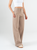 Ref: 069786 Pantalón mom flare, sin prense, tono arena, tejido plano liviano, tiro alto