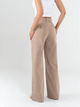Ref: 069786 Pantalón mom flare, sin prense, tono arena, tejido plano liviano, tiro alto