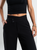 Ref: 069820 Pantalón palazzo, sin prenses, tejido plano liviano, detalle en pretina, tono negro