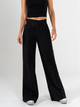 Ref: 069820 Pantalón palazzo, sin prenses, tejido plano liviano, detalle en pretina, tono negro
