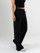 Ref: 069820 Pantalón palazzo, sin prenses, tejido plano liviano, detalle en pretina, tono negro