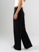 Ref: 069823 Pantalón palazzo, detalle delantero, tejido plano liviano, tiro alto, tono negro