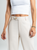 Ref: 069827 Pantalón mom flare, sin prenses, tejido plano liviano, tiro alto, detalle en pretina, tono arena
