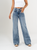 Ref: 065724 Jean Mom Flare, rígido, tiro alto, tono azul medio, detalle en pretina