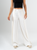 Ref: 069805 Pantalón palazzo, detalle delantero, tejido plano liviano, tiro alto, tono ivory