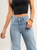 Ref: 064977 Jean Mom Flare, rígido, tiro alto, tono azul medio, detalle en pretina