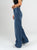Ref: 064931 Jean Mom Flare, rígido, cortes en pierna, tiro alto, tono azul medio oscuro